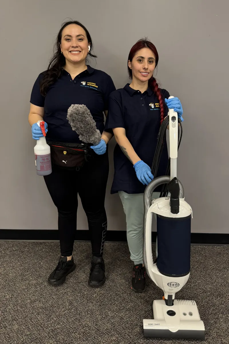 Fresca Cleaners professional team in uniform with cleaning equipment